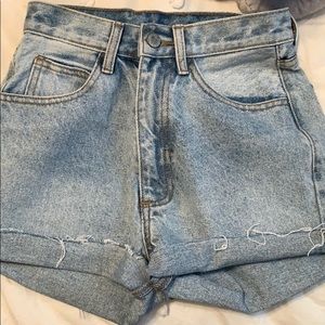 distressed light mom jeans